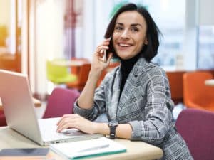 Assessor professional recognition — BIAP membership post-nominal letters woman on the phone
